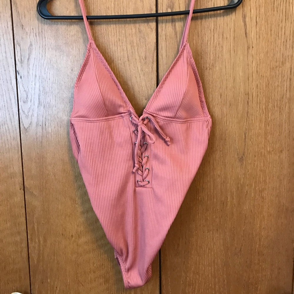 coral colored body suit